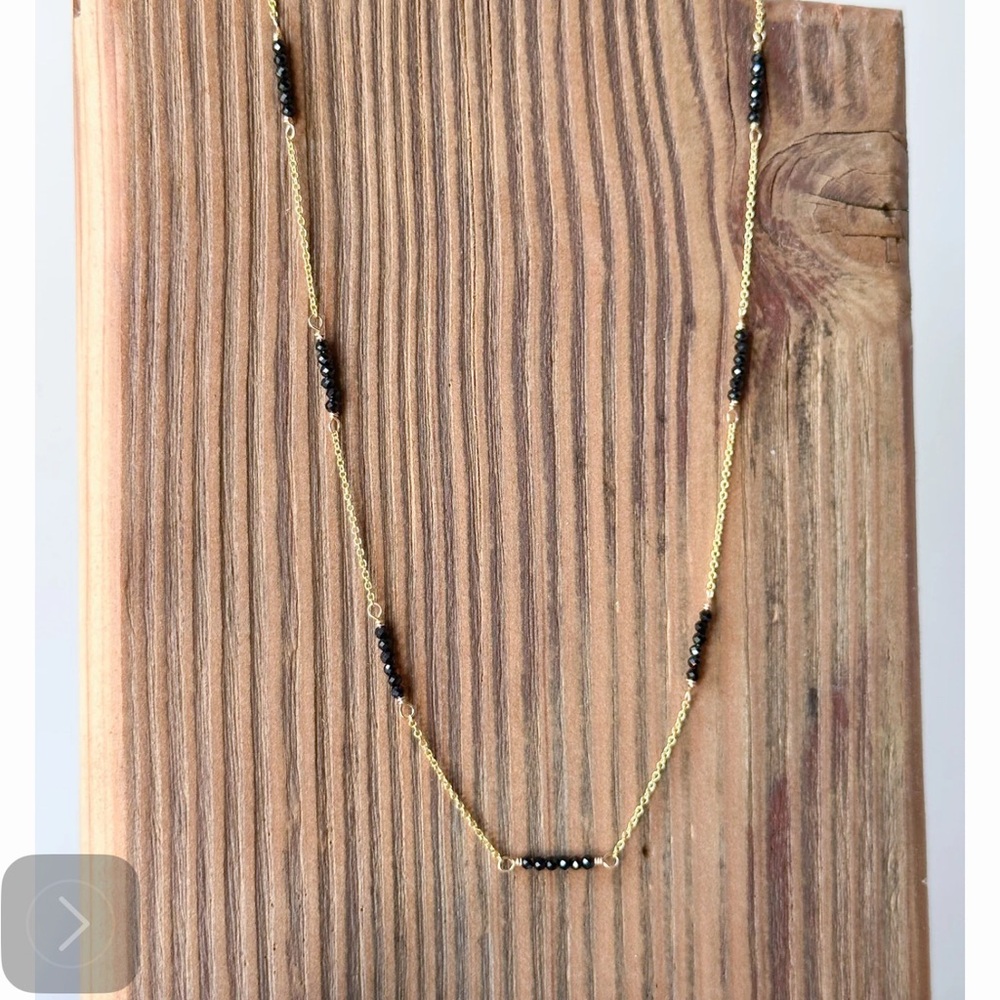 Elegant Gold and Black Beaded Necklace